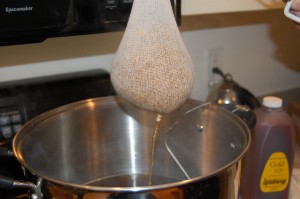 Let the steeping bag drain back into the kettle